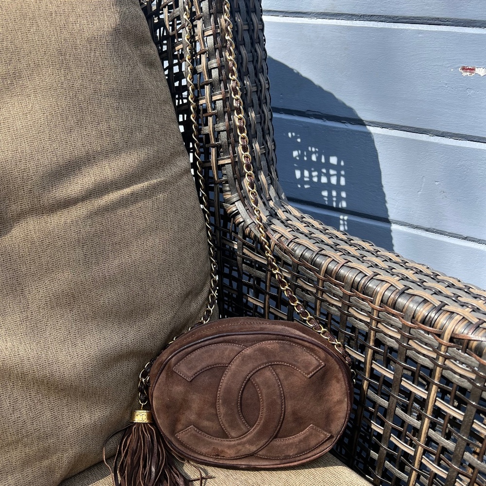 Vintage oval Chanel brown suede mini cross over bag